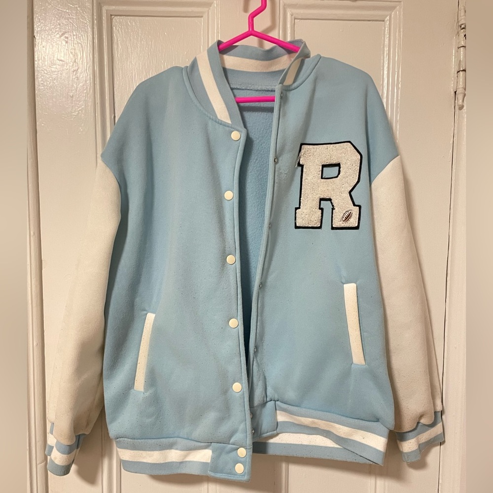 blue varsity jacket